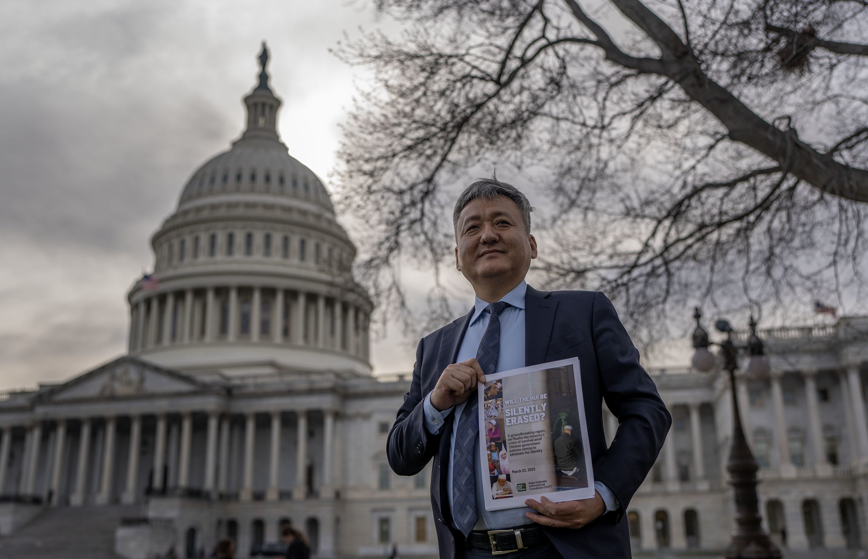 Ma walks after presenting a report on the Chinese government’s alleged crimes against the Hui Muslim minority of China in Washington, DC, Tuesday, March 21, 2023. (RFA Photo/Gemunu Amarasinghe)