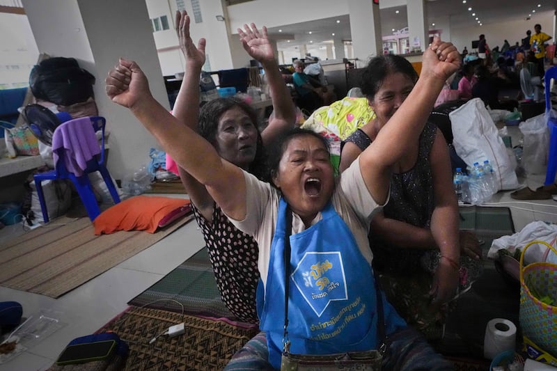 Thai residents who fled homes following the clashes between Thai and Cambodian soldiers react at an evacuation center in Surin province, Thailand, July 28, 2025 after hearing there will be a ceasefire.