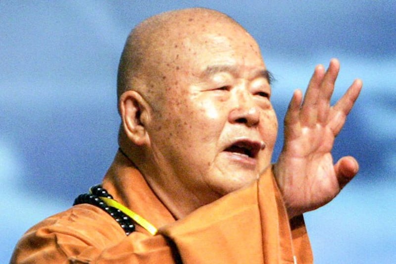 Venerable Master Hsing Yun, founder of Taiwanese Fo Guang Shan, delivers a speech at the opening of the first World Buddhist Forum in Hangzou, China, April 13, 2006. (Eugene Hoshiko/AP)